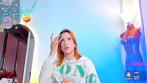 Red-haired beauty wearing stockings plays with her toys