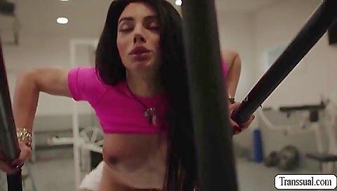 Brunette in the gym in the gym is rimmed by a huge dick