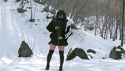 Exposing her pussy in the snow while riding a horse