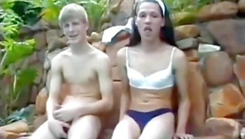 A vintage blonde with a small tattoo is fucked in the backseat